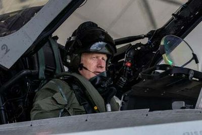 Still the Top Gun? Boris Johnson visits RAF base as Tories vote on his replacement