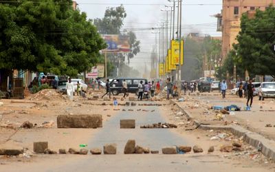 Sudan forces fire tear gas at protests as death toll from tribal clashes rises