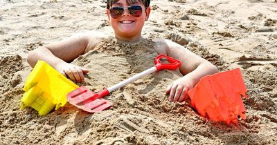 Families hit the beach as heatwave hits Merseyside