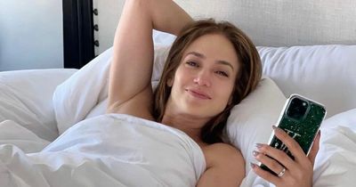 J-Lo shows off wedding ring for first time in bed after marrying Ben Affleck