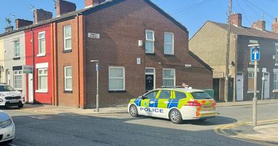 Shots fired at a house as man in green coat seen running from the scene