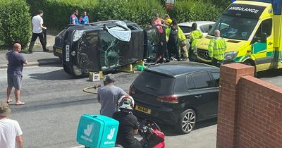 Crash outside Lockleaze houses leaves car flipped on its side and driver injured