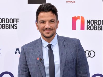 Peter Andre still straightens curly hair after suffering racist bullying as a child