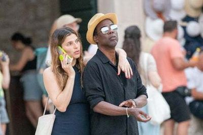 Chris Rock and Lake Bell confirm romance as they jet off on romantic holiday