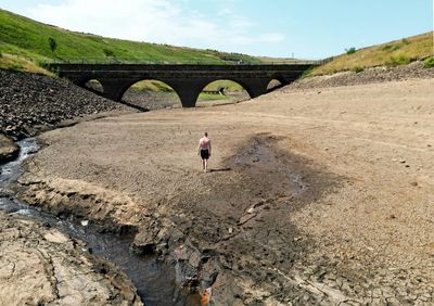 Disruption as UK swelters in extreme heat, with 41C forecast for Tuesday