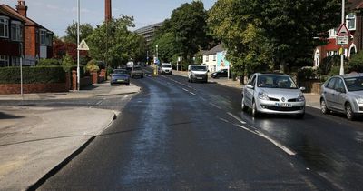 'It sounded like cars were driving through water': A road in Stockport has MELTED due to the extreme heat