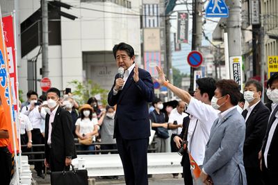 Analysis-The 2.5 seconds of security lapses that sealed Shinzo Abe's fate