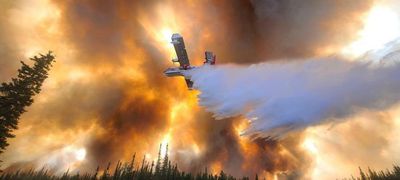 ‘It goes up like tinder’: unprecedented blazes envelop Alaska