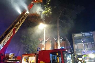 Hornchurch fire: Woman hospitalised and 60 evacuated as 100 firefighters tackle blaze at block of flats