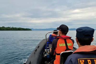 Rescuers search for 13 after boat sinks in Indonesian waters