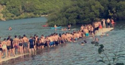 Police called as jetty collapses under weight of scores of teenagers at beauty spot
