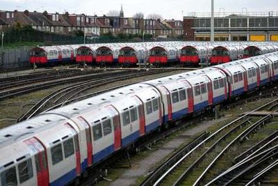 Which London Tube lines are delayed or not running today due to the UK heatwave?