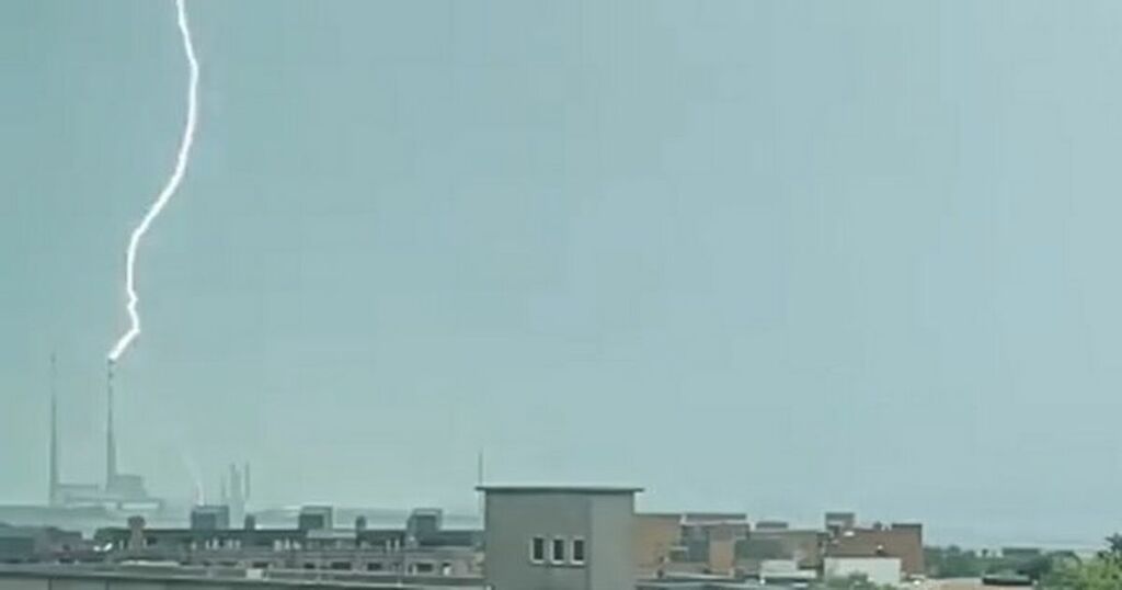 Watch Incredible footage of lightning striking iconic…