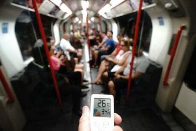 The Melt line: 1.5m Londoners brave the Tube and bus as heatwave hits new record