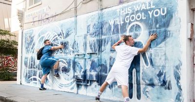 Hot and bothered commuters given chance to refresh - on a cooling billboard