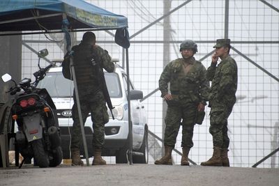 Ecuador says 12 killed in prison riot, still identifying dismembered bodies