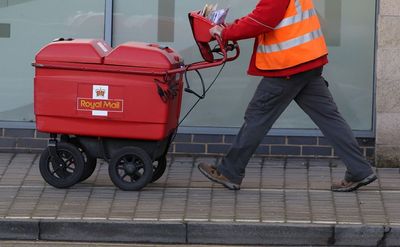 Royal Mail workers vote to go on strike in pay dispute