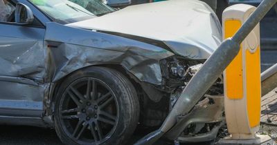 Dramatic pics show how Audi ploughed into road sign in three car crash