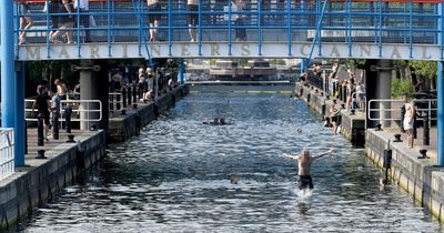 Despite repeated warnings and the death of a teenage boy dozens of people are STILL swimming at Salford Quays