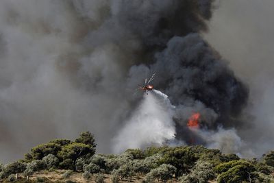 Greece tames wildfire near Athens, new blazes rage in 'tough' Mediterranean summer