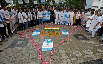 India reports 20,557 new COVID-19 cases