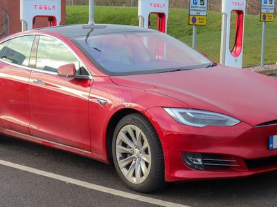 Benzinga Before The Bell: Jury Finds Tesla 1% Negligent In Model S Crash, Bitcoin Sees $148M Liquidations, Amazon-Backed Zoox Robotaxi Set For Debut And Other Top Financial Stories Wednesday, July 20