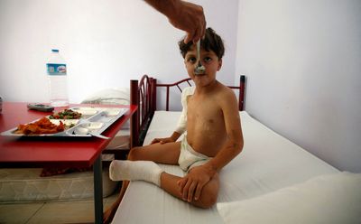 Denying refugees and migrants healthcare violates rights, WHO says