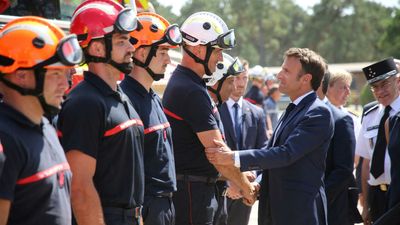 Macron tours blaze devastation as firefighters battle French wildfires