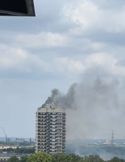 More than 100 firefighters tackle blaze at ‘cluttered’ top-floor flat