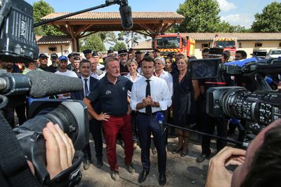 France's Macron pledges to step up fight against climate change as he visits wildfires