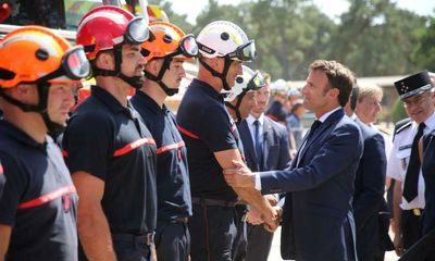 Macron vows to rebuild and replant by ‘different rules’ after French fires