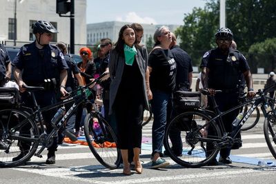 AOC pushes back on claims she faked being handcuffed during arrest