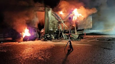 Fruit and vegetable truck explodes into flames after crash, cutting Bruce Highway