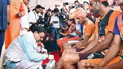 Pushkar Singh Dhami washes kanwarias’ feet, 1st Uttarakhand CM to do so
