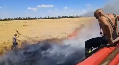 Ukrainian Firefighters And Farmers Battle Crop Fires Caused By Russians Bombing Fields