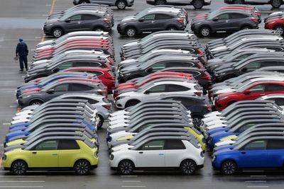 Japan trade deficit grows as oil prices surge, yen drops