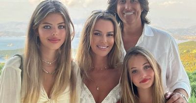 Amanda Holden poses with her lookalike daughters in rare family portrait on Greek trip