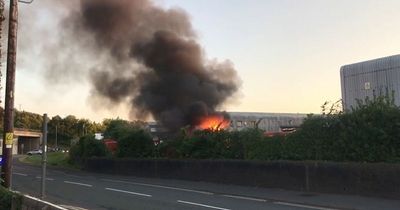 Royal Mail post vans catch fire sending up plumes of thick black smoke above sorting office