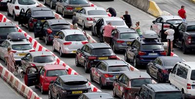 Families on summer getaways face three-hour queues at Dover