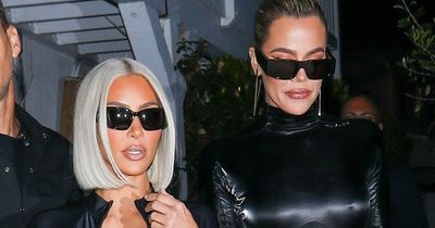 Kim and Khloe Kardashian flaunt shrinking curves in clingy outfits amid surgery claims