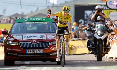 Vingegaard breaks Pogacar to win stage and all but seal Tour de France glory