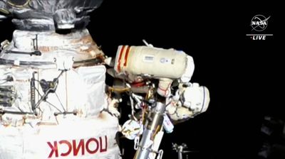 Italian, Russian share rare spacewalk amid Ukraine tensions