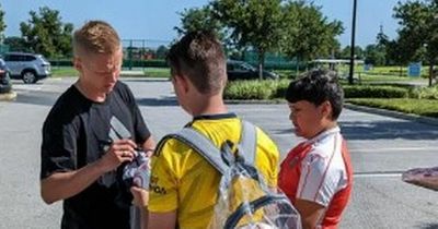 Oleksandr Zinchenko spotted signing Arsenal shirts despite lack of announcement