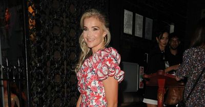 Newly-single Helen Skelton looking happy as she stuns summer party in £780 thigh-split dress