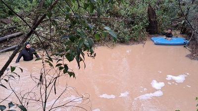 Body recovered after man swept away by floodwaters in Nanango, low causes dangerous weather conditions across Queensland