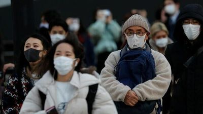 Japan battles seventh COVID wave as Tokyo hits record of almost 32,000 new daily cases