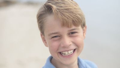 Beaming Prince George photographed by Kate for his official birthday picture