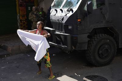 A raid in a Rio favela left 18 dead, sparking renewed police violence complaints