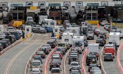Holidaymakers warned of Dover ferry queues; survey shows UK economy slowing – as it happened