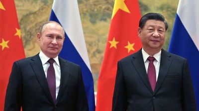 Japan Warns of Rising Global Tension, Russia-China Arms Ties